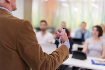 teacher with a group of students in classroom