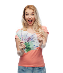 happy young woman with euro cash money