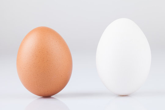 two chicken eggs isolated on a white background