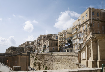 Fototapeta na wymiar Barriera Wharf and Victoria Gate located at the Old City of Valletta, Southern Harbour District, Malta 