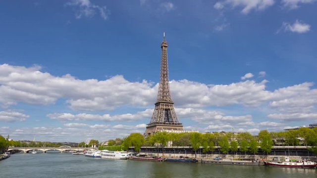 Bateaux Mouches tour boat on Seine River passing the Eiffel Tower, Paris, France, HD video (1920X1080)