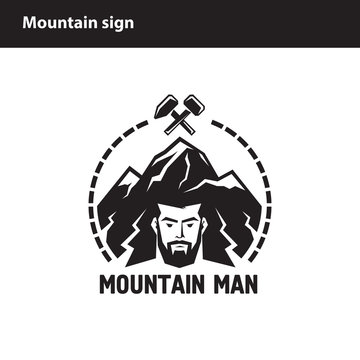 sign of man on a background of mountains
