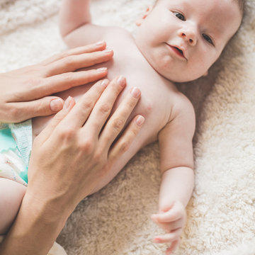 Child and mother caring hands