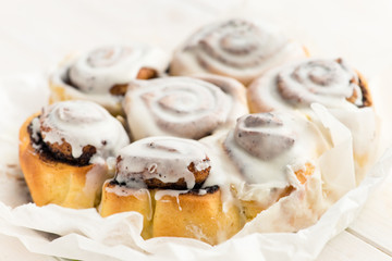Delicious baked cinnamon rolls, Buns Macro with shallow dof
