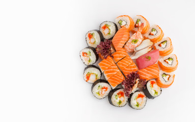Sushi set of different rolls top view on a white background isolated