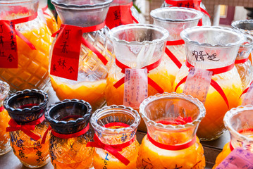 Close-up of candles in Chinese buddhist temple
