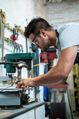 Portrait of a carpenter working on his craft