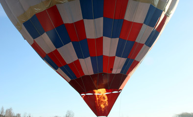 the gas burner flame under the air balloon before the start