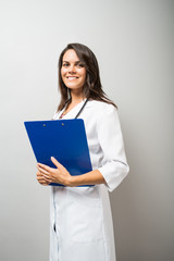 Woman doctor holding a document