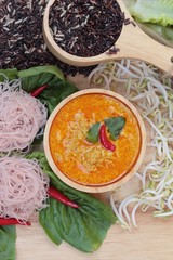 Thai curry with riceberry rice noodle .