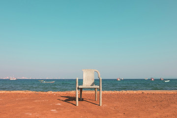 a beautiful chair in front of a nice and relax sea beach view. I took it on my vacation. Love the color of it.