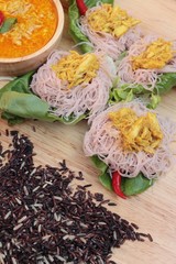 Thai curry with riceberry rice noodle .