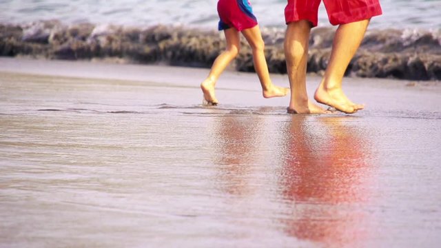 Kid playing in the beach
