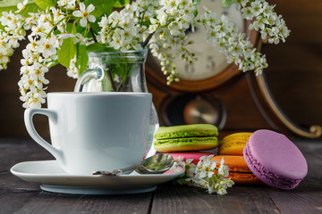 Spring breakfast with flowers and macaroons