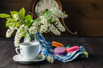 Spring breakfast with flowers and macaroons