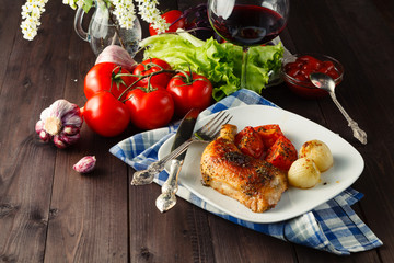 Roasted chicken legs with vegetables