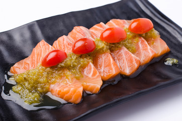 Slices of Salmon Served with Spicy Sauce