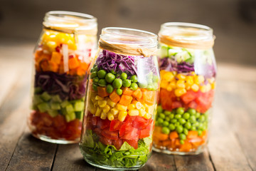 Fototapeta na wymiar Fresh vegetable salad in a mason jar