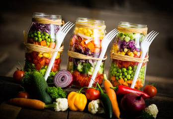 Fresh vegetable salad in a mason jar