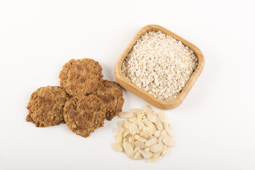 Oat Cookies with ingredients on a white background