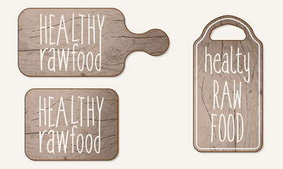 Wooden breadboard and inscription healthy raw product