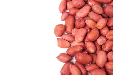 frame of peeled peanuts on a white background
