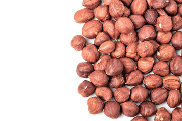 peeled hazelnuts isolated on white background macro