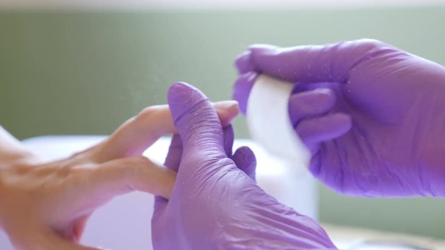 Pro doing French nail manicure finishing and buffing hand in salon 4K 2160p 30fps UHD footage - Sand paper buff applied on finger tips 4K 3840X2160 UltraHD HD video 