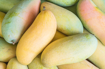 Closeup pile of mango textured background