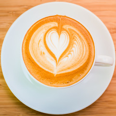 hot coffee on wood background