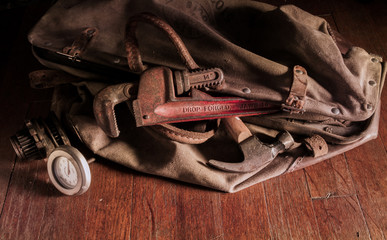 Bag of Tools on Wood Floor
