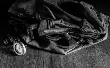 Bag of Tools on Wood Floor