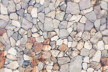 Abstract background of stone wall texture (filter effect used)