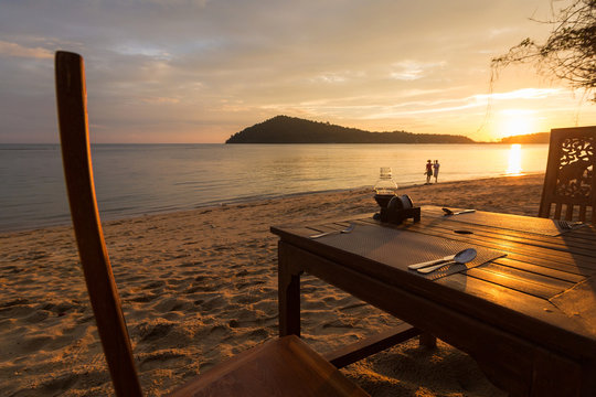 Romantic dinner with sunset, beach and ocean on Koh Chang Island