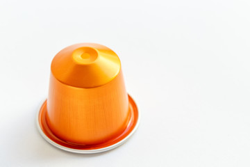 single capsule coffee on a white background isolated