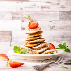 Fotobehang Dutch mini pancakes called poffertjes © Iryna Melnyk