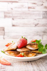 Dutch mini pancakes called poffertjes