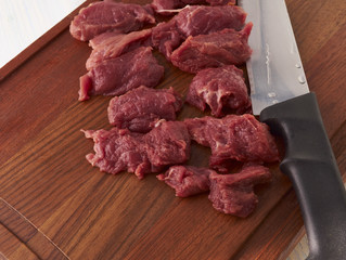 cooking a meat dish.