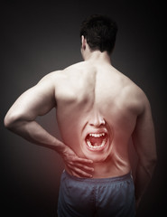 Male suffering from low back pain