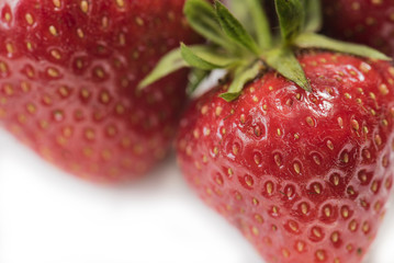 Red strawberry on white background