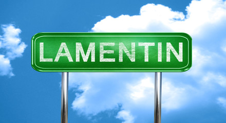 Obraz premium lamentin vintage green road sign with highlights