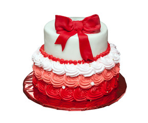 Birthday cake with bow on top isolated on white background