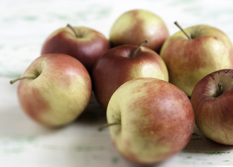 Fototapeta na wymiar apples on wooden background