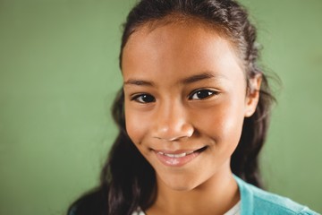 Fototapeta premium Smiling girl standing