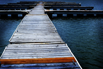 Fototapeta premium Old Wooden Dock by Water