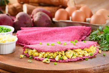 Pink tapioca filled with scrambled eggs