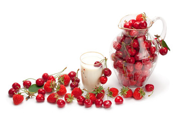 Strawberries with cream and ripe cherry.