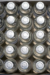 vaccination vials or drug vials in box on pharmacy counter