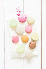 Dessert - pastel french macarons cakes on rustic white