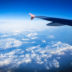 Fototapeta na wymiar Aerial view of earth from an airplane window. Bleach Bypass effect,